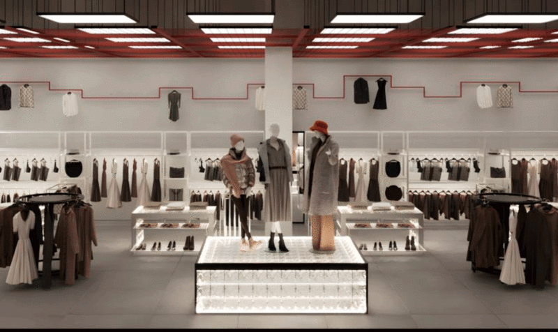 Women's section of a clothing store with a terracotta-colored metal mesh roof and a line that unifies the entire perimeter IED Barcelona