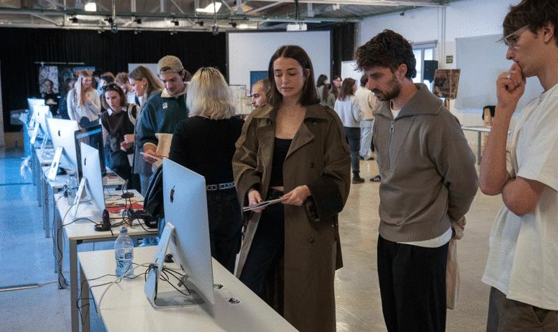 Students and visitors of the IED Barcelona Portfolio Review Day Visual Arts 25 exhibition