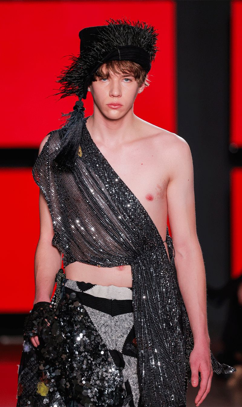 Male model walking the runway wearing the "Devolata ao mar" collection by IED Barcelona graduate designer Gabriel Silva Barros at Sangue Novo - ModaLisboa