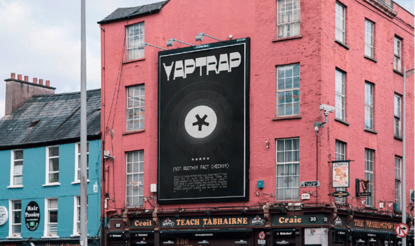 Building with a sign advertising the YapTrap app